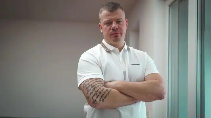 Picture of a tattooed doctor crossing his arms - tattoo healing - the healing process for a tattoo - tattoo aftercare