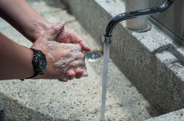 tattoo studio hygiene. person washing hands