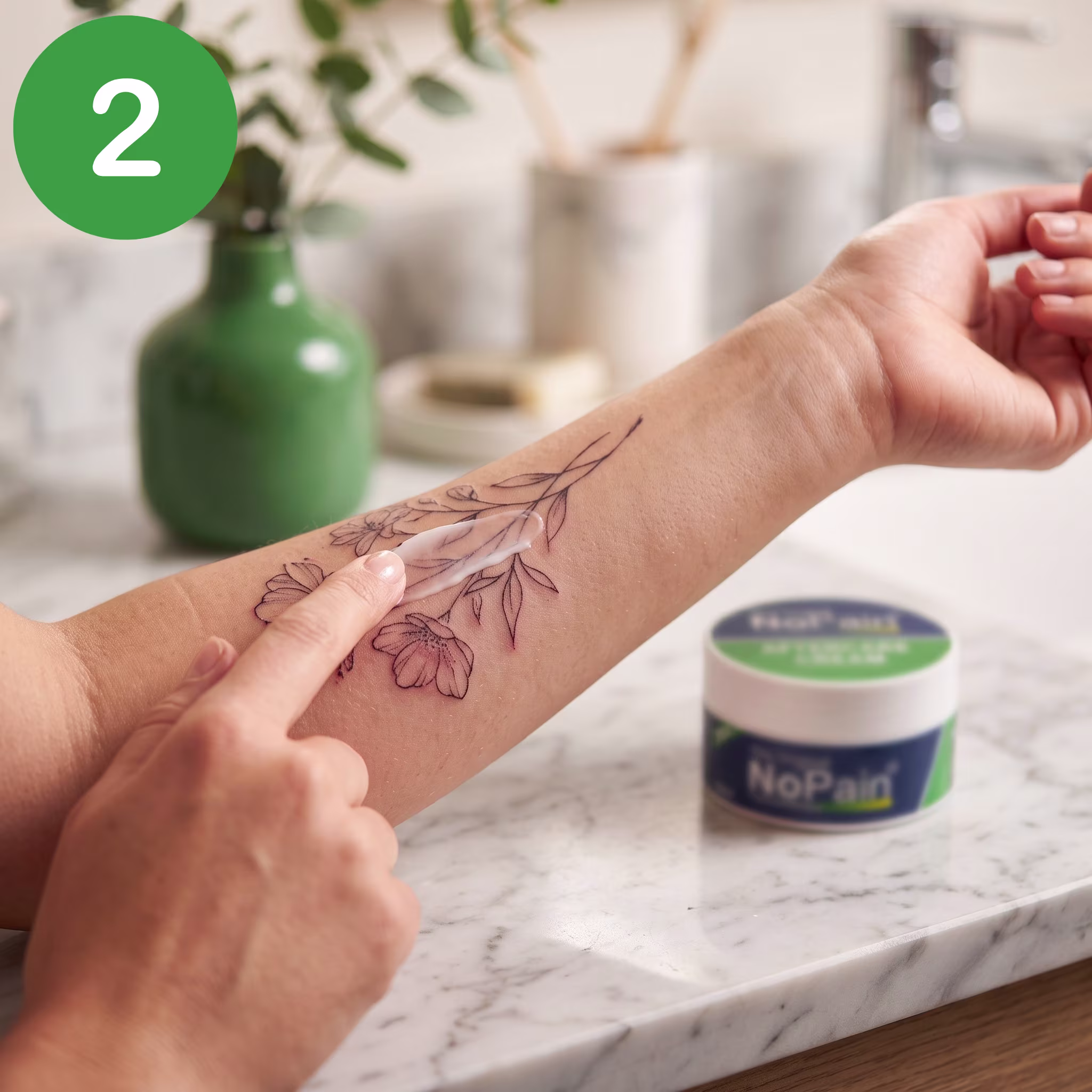 Gently wash the tattoo with lukewarm water